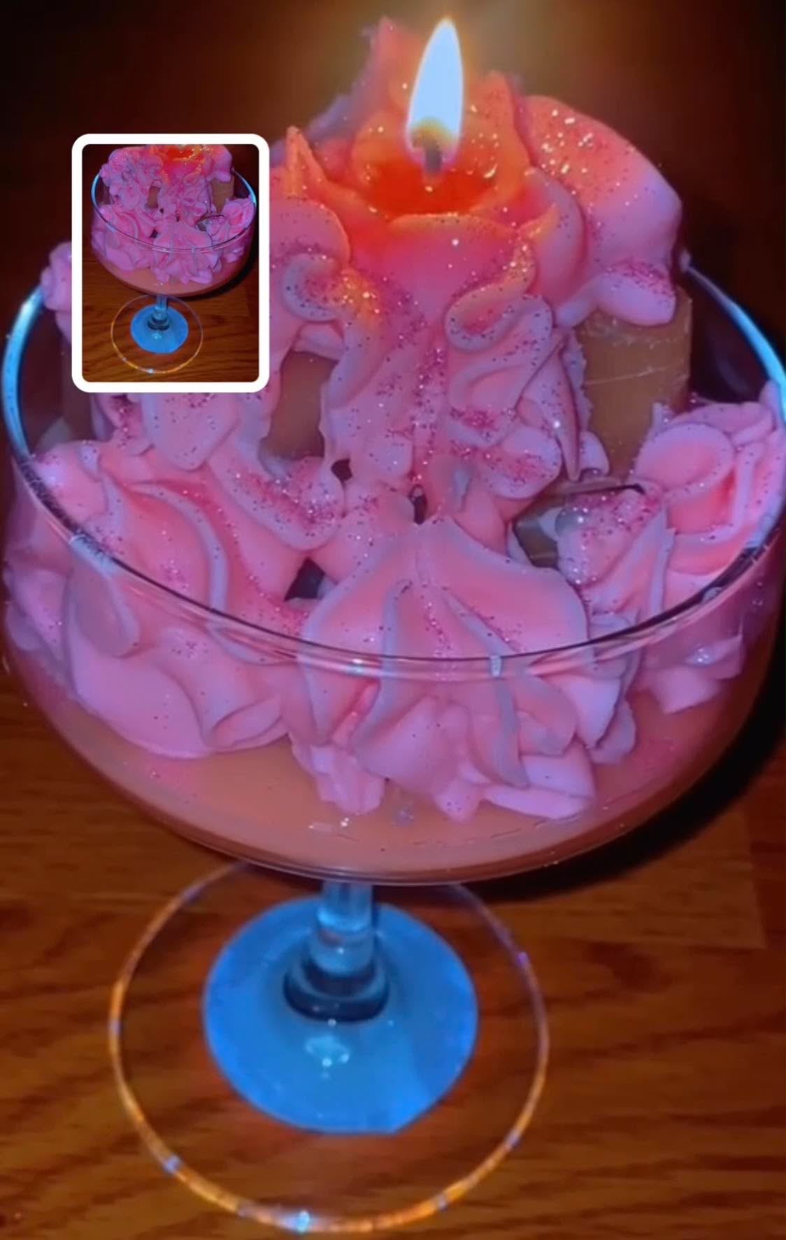 Pink Whip Glitter Candle in an elegant glass with blue base